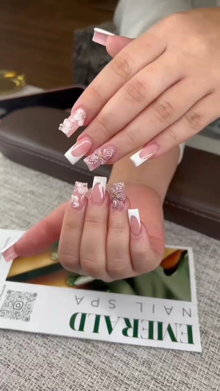Custom nail art with floral motifs