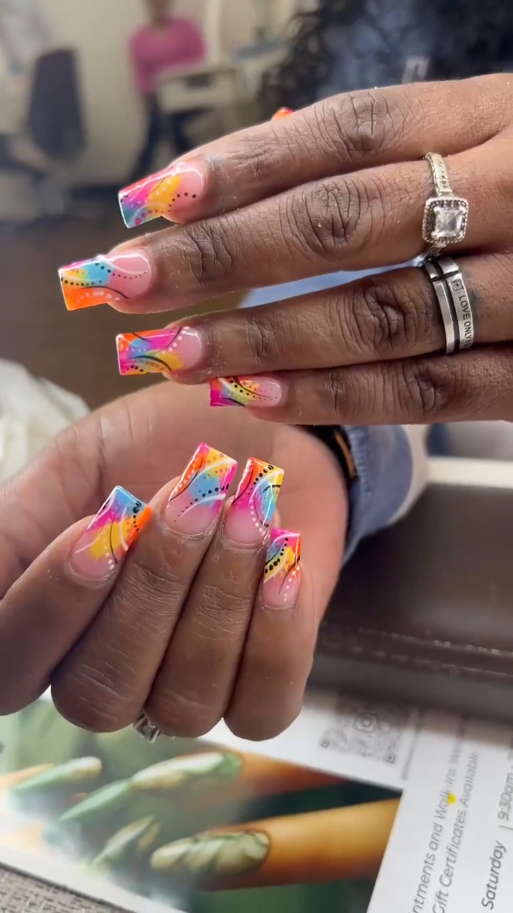 Vibrant nail art by Emerald Nail Spa